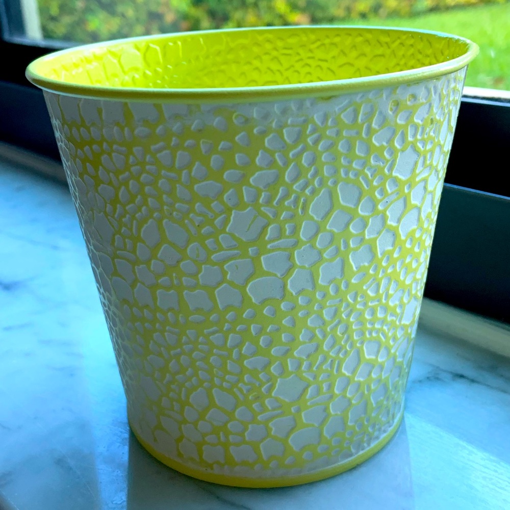 A set of four embossed rose tin flower pots